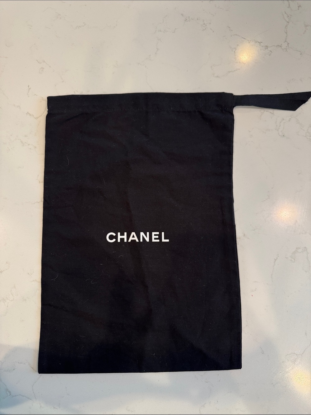 CHANEL Black Drawstring Dust Pouch with White Logo